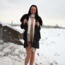 Smiling brunette Anna T strips to show her beautiful body at winter