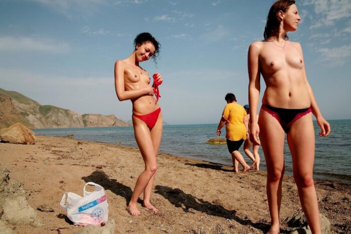 Two russian girls smoke naked at public beach