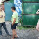 Russian blonde Danuta D smokes in the company of strangers in garages