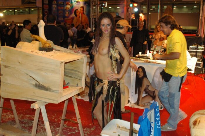 Russian girl with dreadlocks poses naked at erotic expo