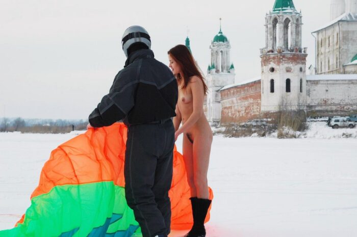 Young red-haired girl Tamara K with unshaven pussy on a frozen lake