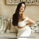 Astrid Herrara looks stunning in her figure hugging white dress. She slip out of it and flaunts her juicy melons and smooth coochie.