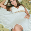 Lia D shows off her natural breasts and sweet slit