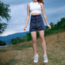 Annamalia unbutton her denim high waist skirt then takes off her white crop top and flaunts her super hot hour glass bootylicious figure in the middle of an open field.