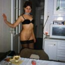 Old photos of bottomless brunette Gella on kitchen