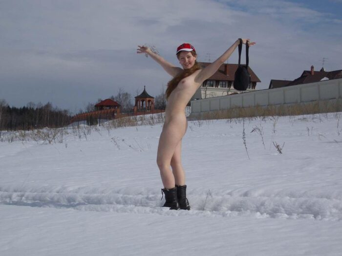 Russian girl Alena B with a handbag rolls bare in the snow