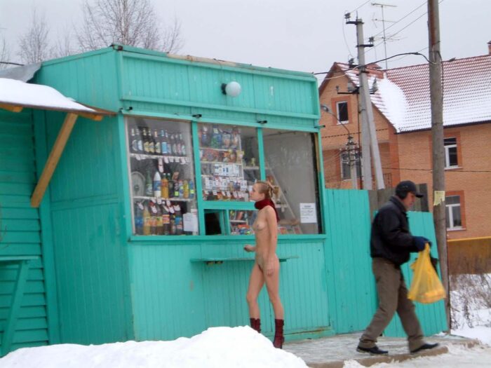 Shameless Ludmila makes purchases in a small store without clothes
