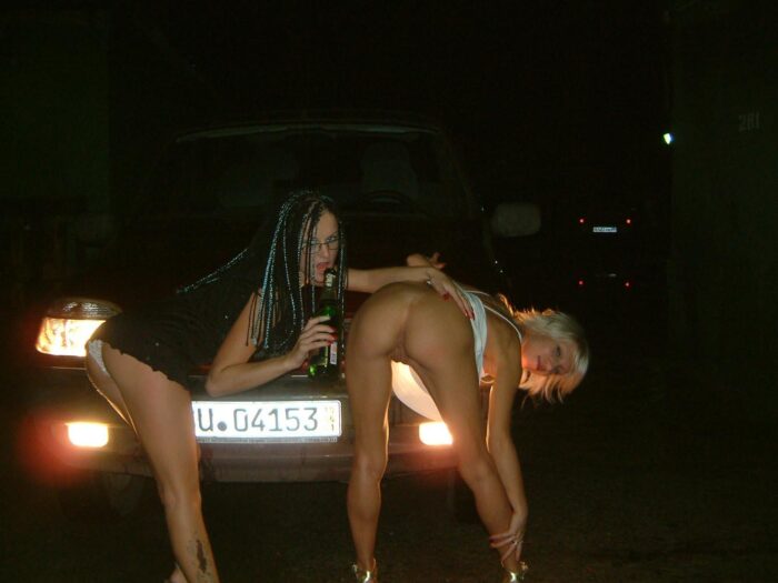Two very hot russian babes posing at night parking