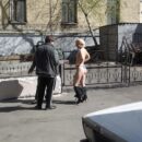 Crazy blonde Lena M undresses in front of strangers