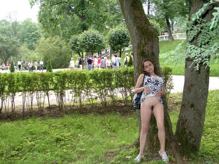 Girl with beautiful tits Luisa raises skirt in very public places