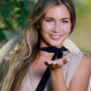 Mary Rock captivatingly undresses in the middle of the prairie and flaunts her bikini tan lines and  gorgeous bubble butt.