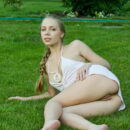 Liv A spreads her lovely legs and shows off her small tits