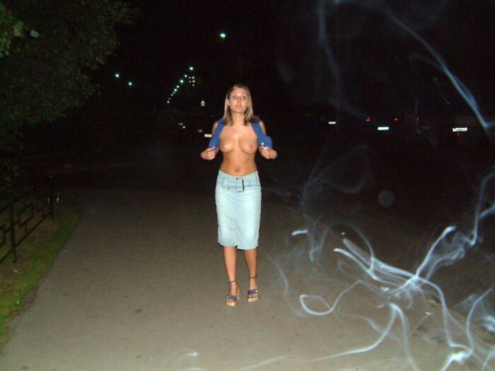Two russian girls posing naked at public park at night