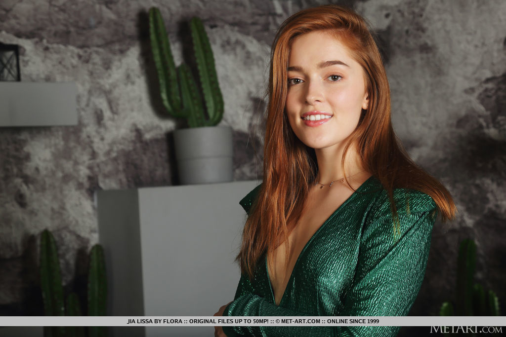 Jia Lissa looks great in her emerald dress and the more when she takes it off and uncover her bootylicious figure and pinkish smooth pussy.
