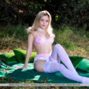 Gorgeous blonde Monika Jelolt looks so hot and dainty on the picnic blanket in her thigh high white stockings and lacy erotic lingerie.