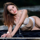 Annamalia steamily strips naked by the river banks and flashes her slender figure and hairless coochie.