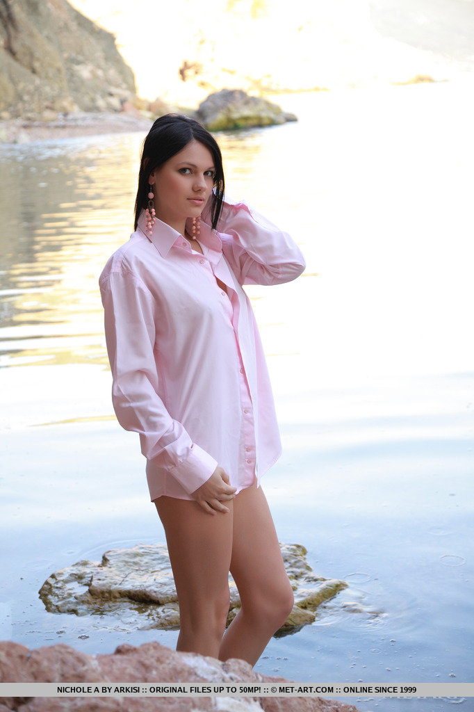 Nichole A takes off her button up shirt and poses naked