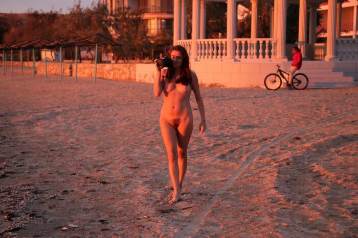 Russian girl Lena W with hairy pussy at sunset beach