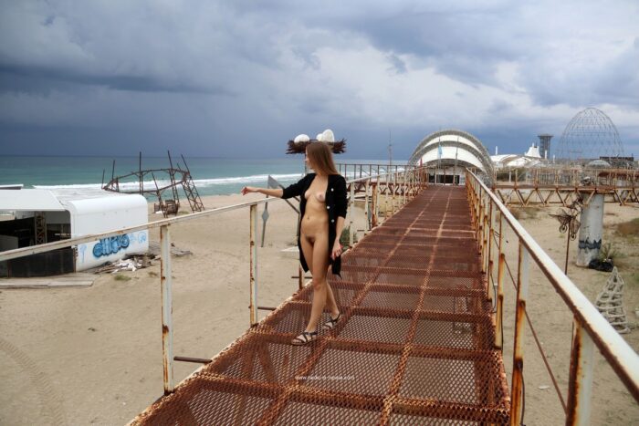 Cure russian girl Valentina K walks naked at beach