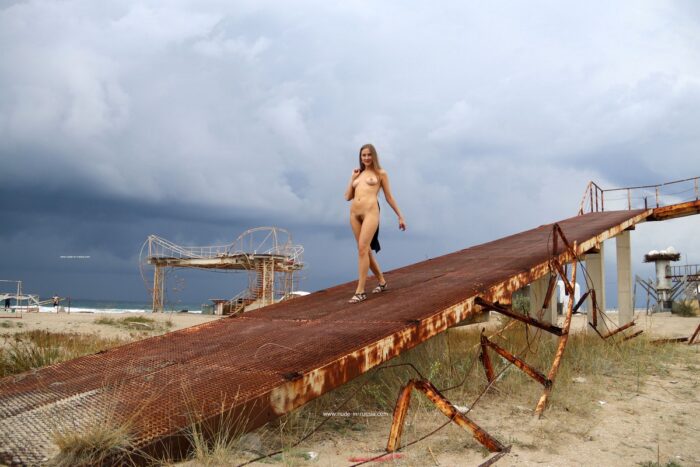 Cure russian girl Valentina K walks naked at beach