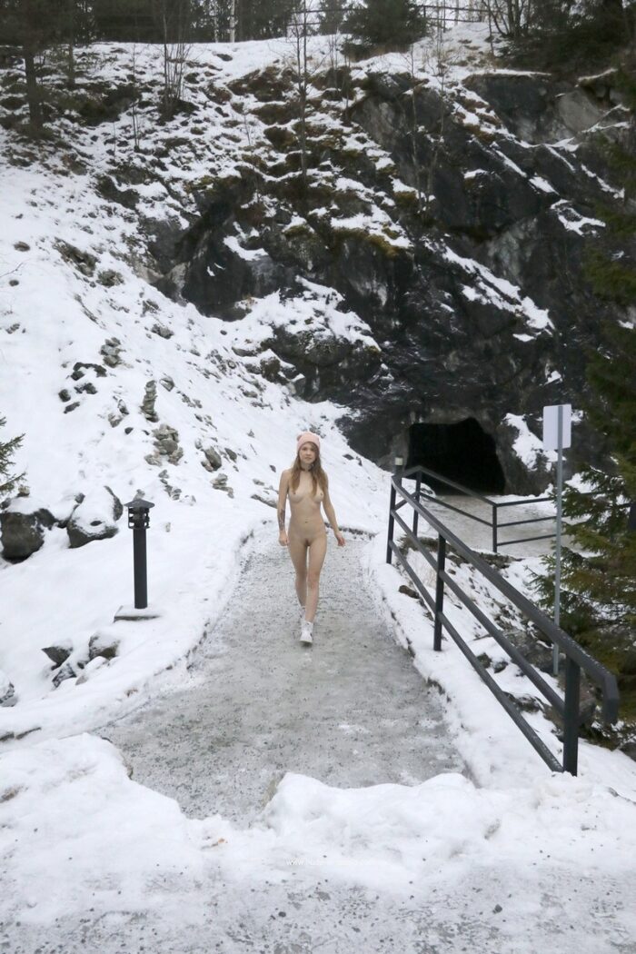 Gorgeous blonde Eva Gold with a perfect body on a snowy quarry