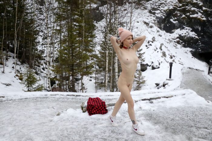 Gorgeous blonde Eva Gold with a perfect body on a snowy quarry