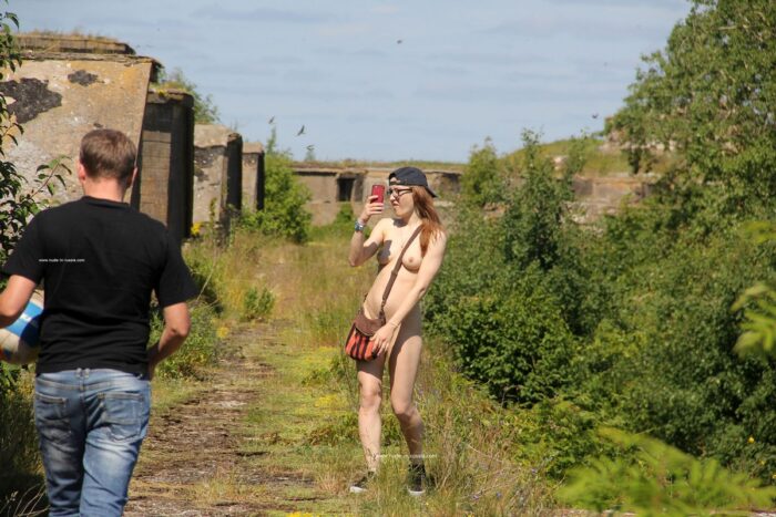Naked russian blonde Abbey walks through the old fort