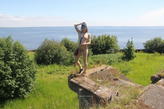 Naked russian blonde Abbey walks through the old fort