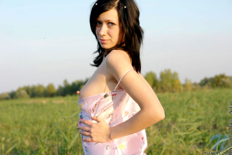 Sweet teen holly reveals her luscious body in the open field