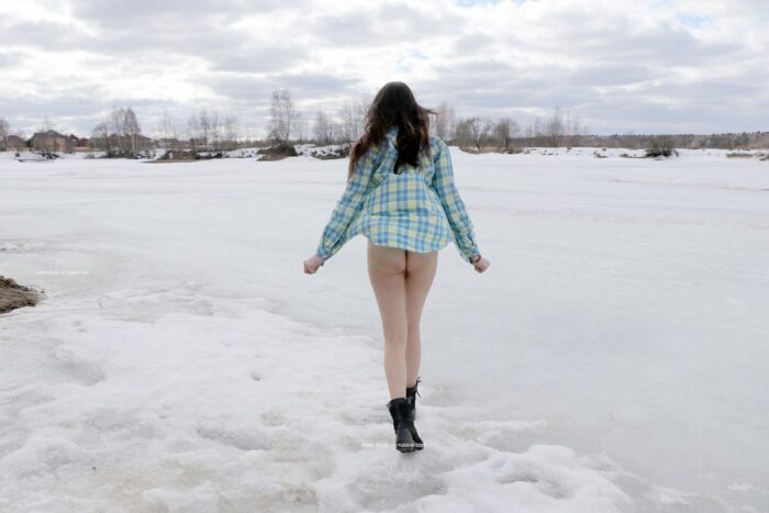 Young russian girl Katja P with small tits at frozen river