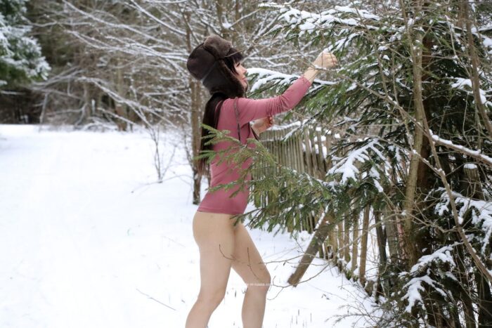 Bottomless tattoed brunette Katrin at winter forest