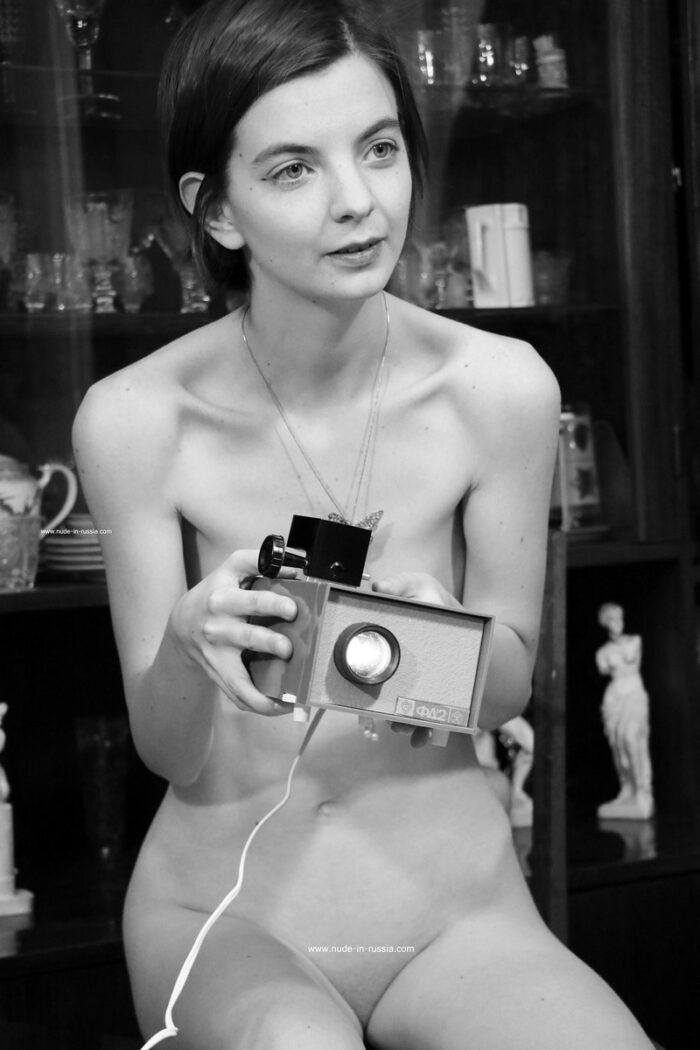 Very skinny russian girl Liza and old soviet projector