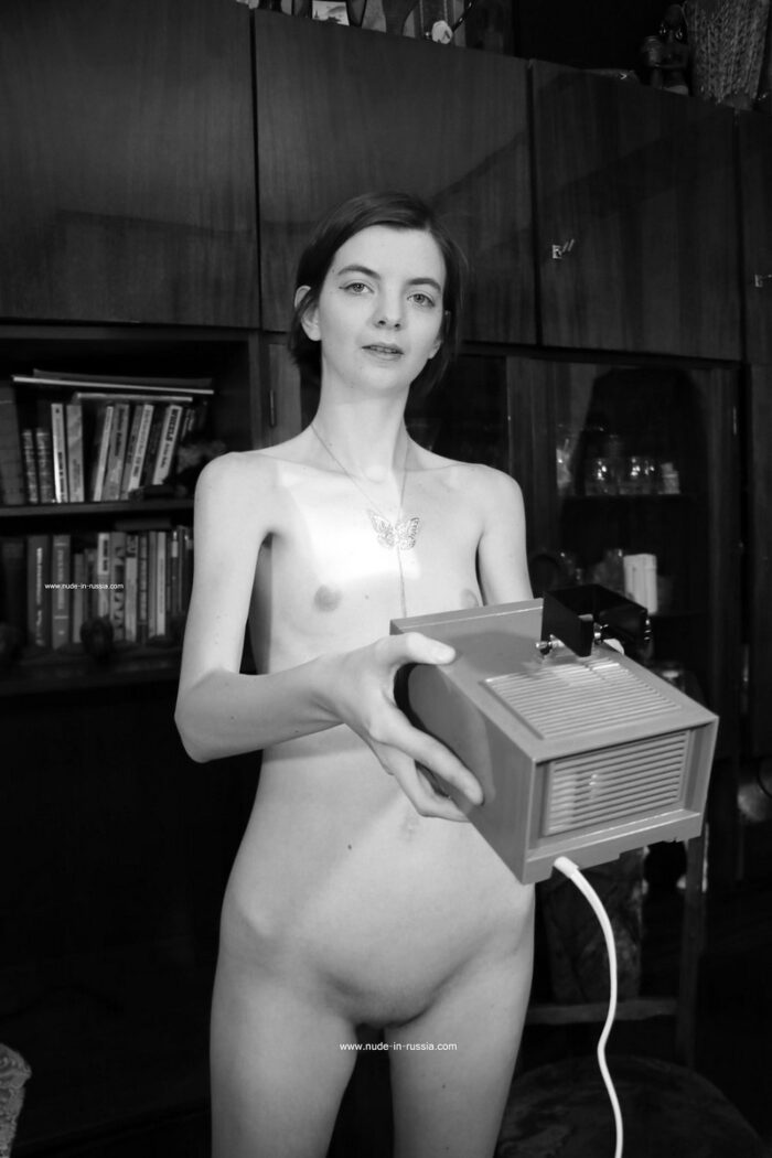 Very skinny russian girl Liza and old soviet projector