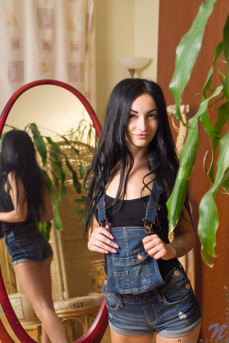 Black haired hottie Rita Raven is a Russian gem who looks incredible as she peels off her clothes in front of the mirror