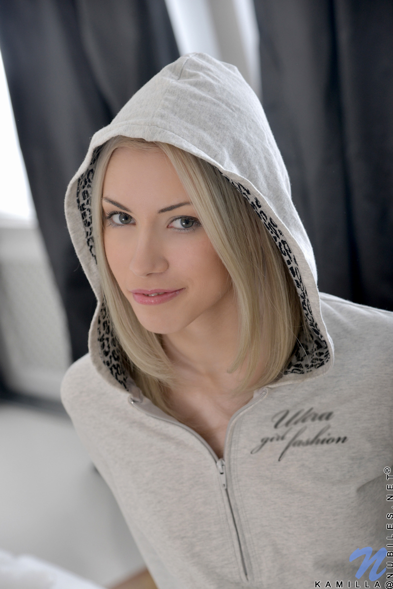 Looking hot in a hoodie, 18 year old Kamilla flirts with the camera like a pro