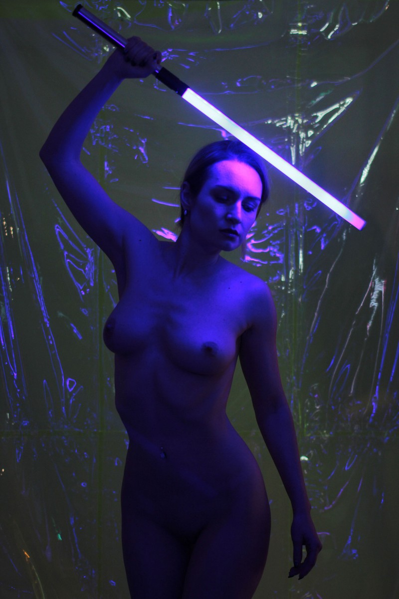 Russian girl Nastia posing in a neon photo shoot