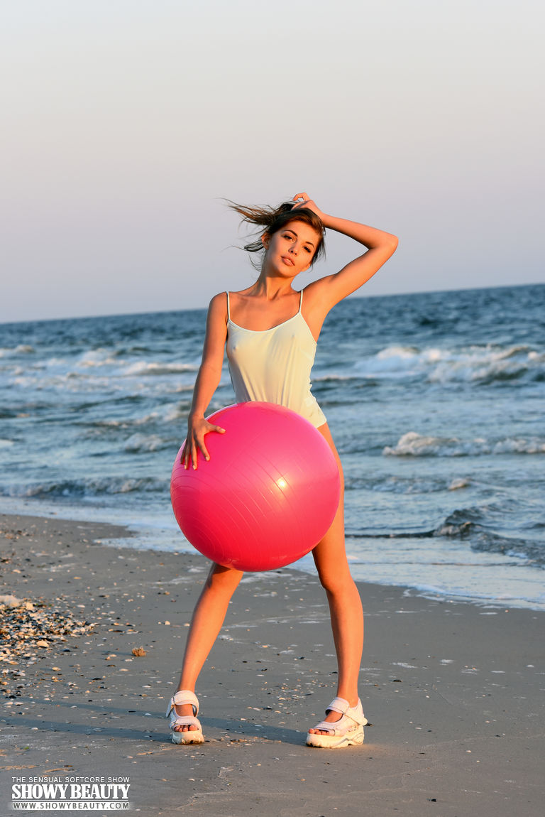 Monika: BEACH FITNESS. Posing on a sandy shore