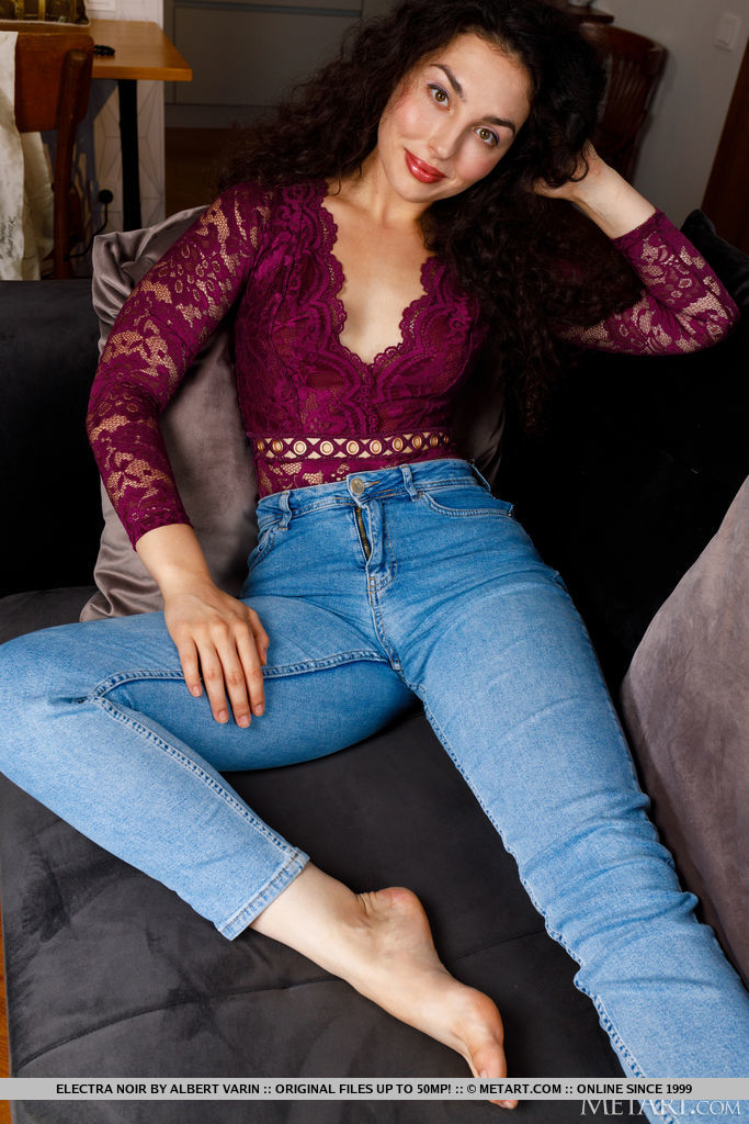 Stunning new model Electra Noir slips out off her skinny jeans and exposes her super hot lace purple bodysuit that accentuates her slender sexy body.