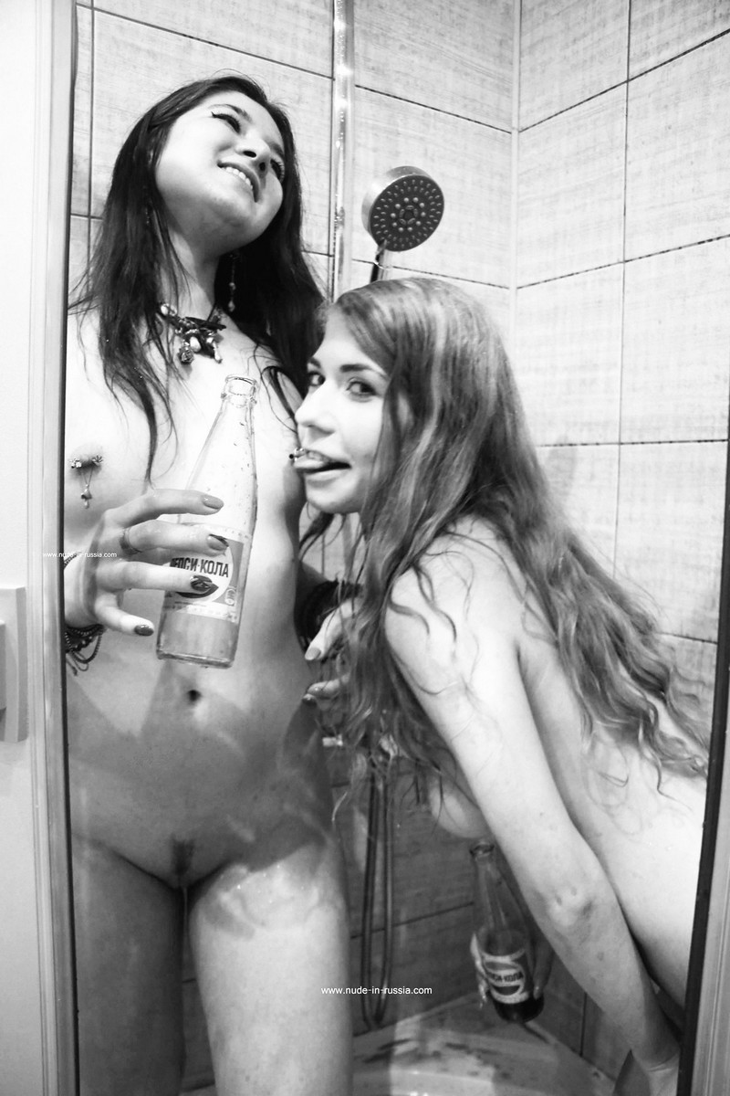 Two long-haired beauties decide to drink Pepsi in the shower