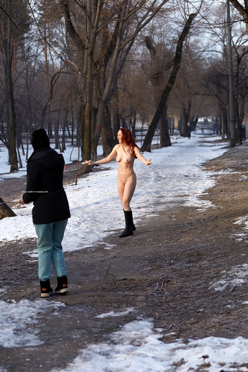 Naked badminton in a city park