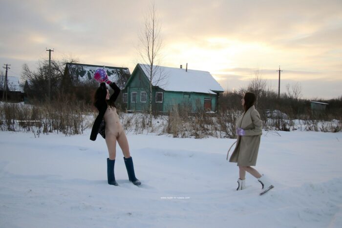 Naked snowball fight in a snowy Russian village