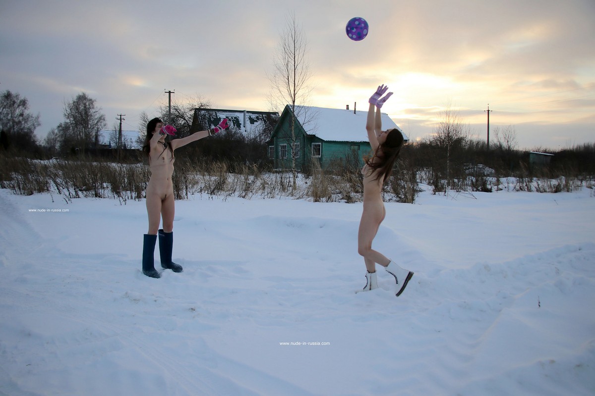 Naked snowball fight in a snowy Russian village