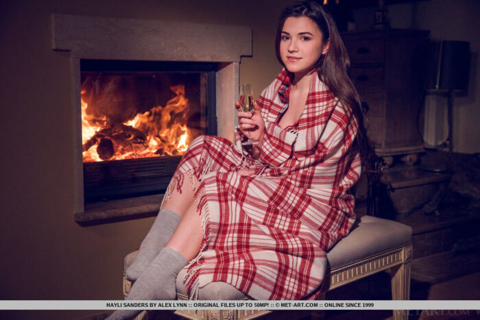 Hayli Sanders takes off her plaid blanket, shirt and panties then keeps herself warm by the fireplace.