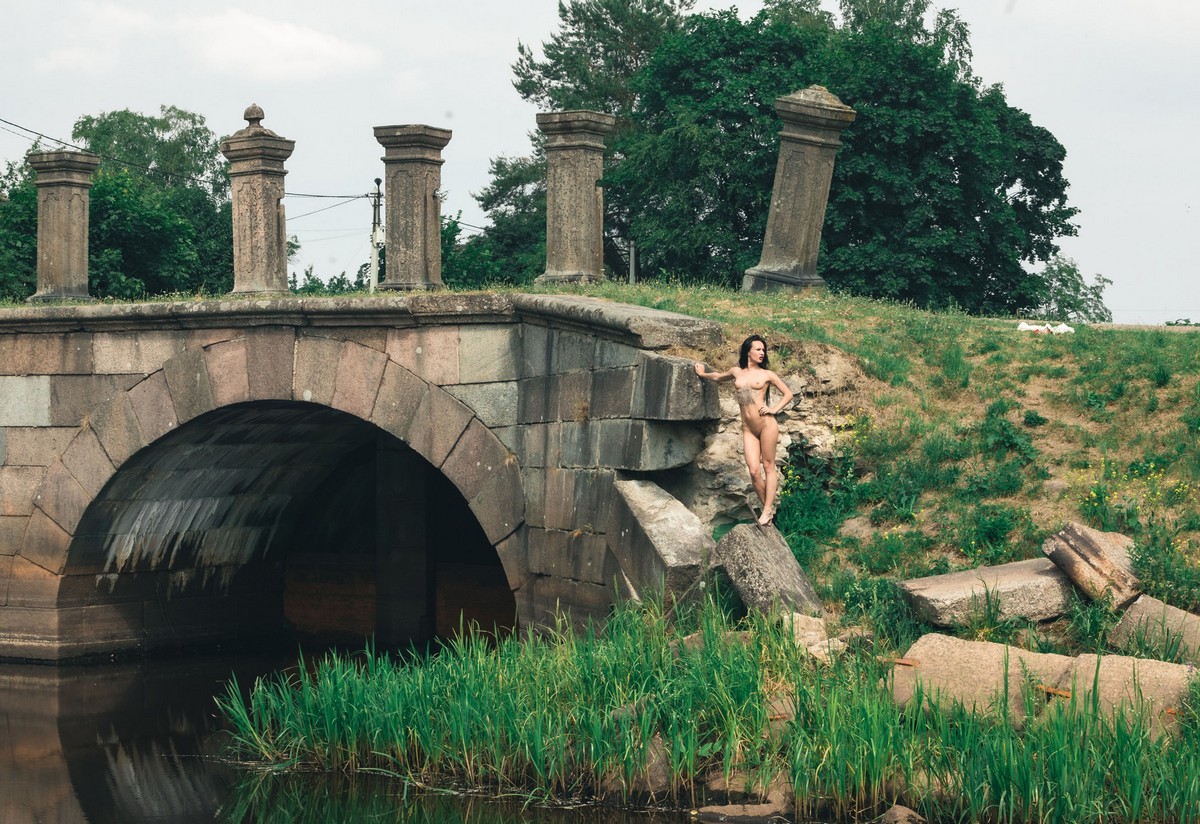 Beautiful longhaired Russian brunette Ada outdoors