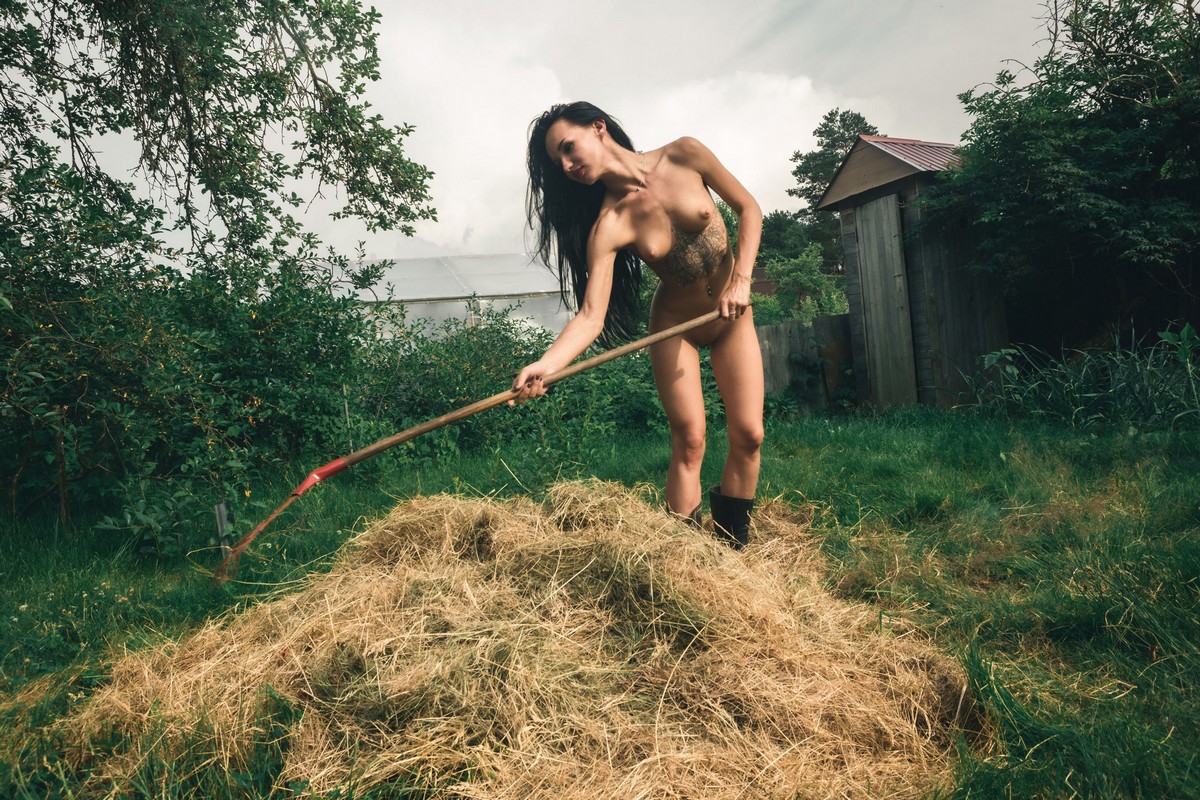 Beautiful longhaired Russian brunette Ada outdoors