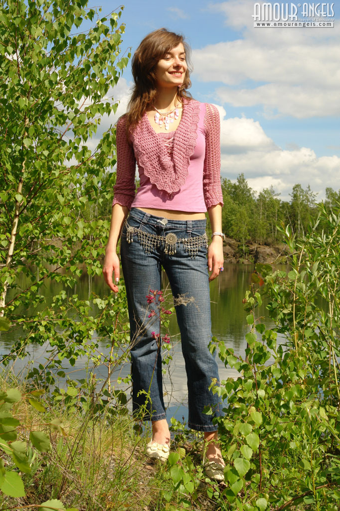 Jini: JINI LAKE. Girl pulling off her jeans