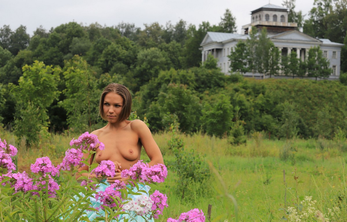 Russian girl Mari poses in beautiful dress