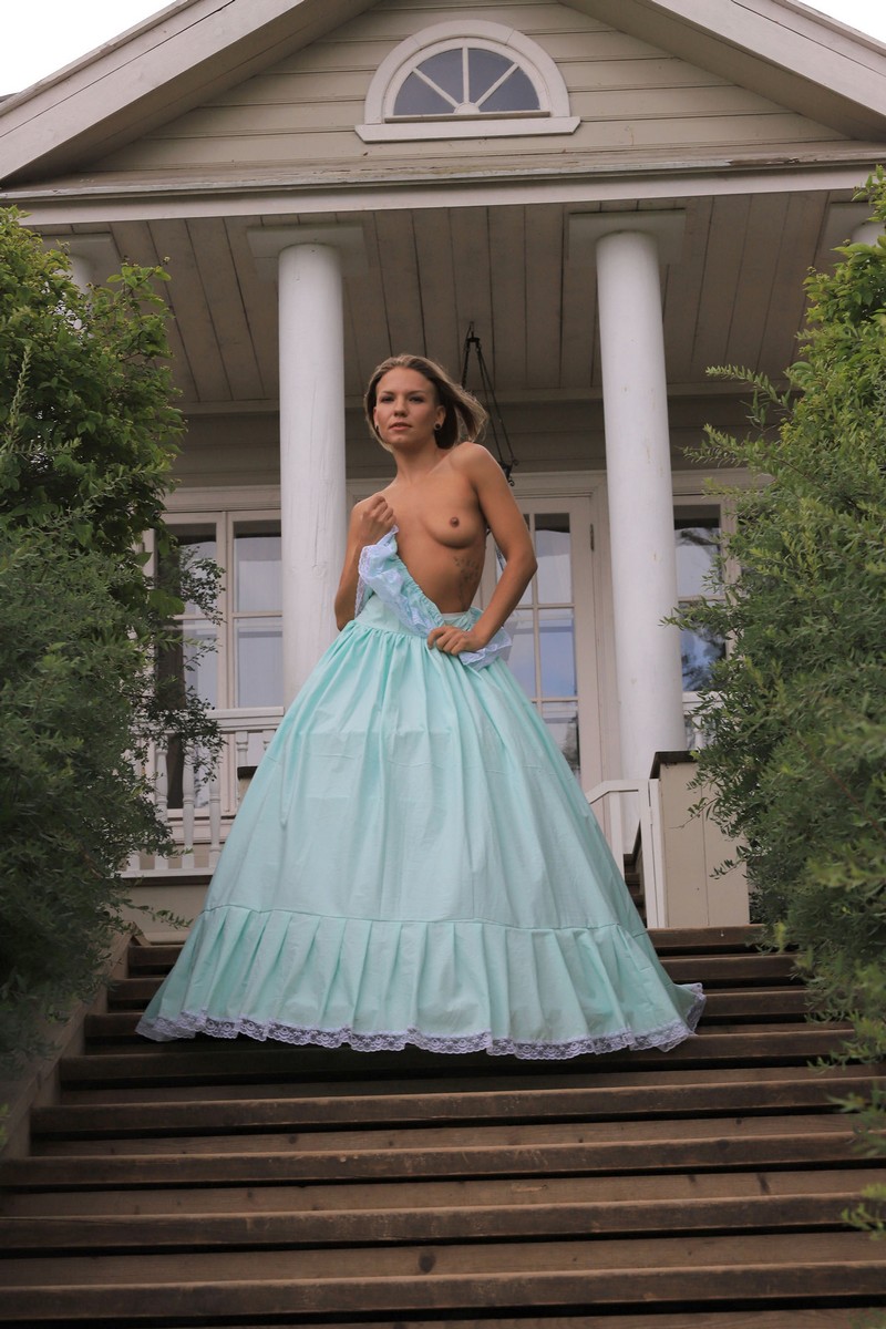 Russian girl Mari poses in beautiful dress