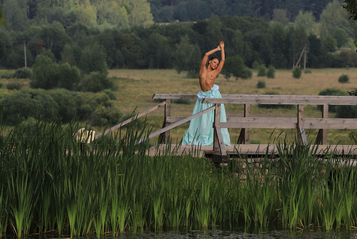 Russian girl Mari poses in beautiful dress