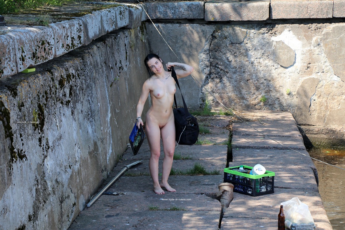 Two young girls take off their panties in an old fort